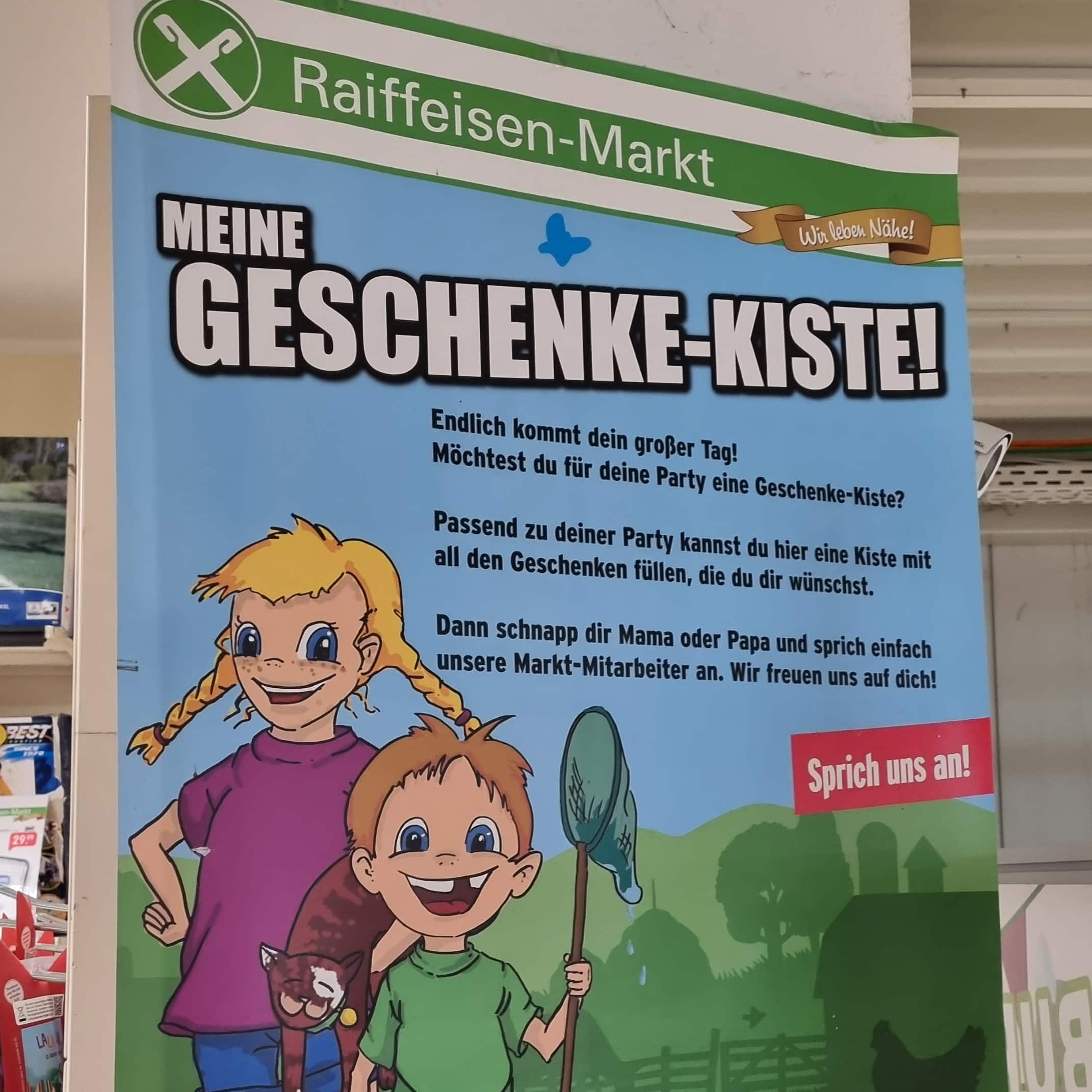 Poster della confezione regalo del Mercato Raiffeisen in una filiale